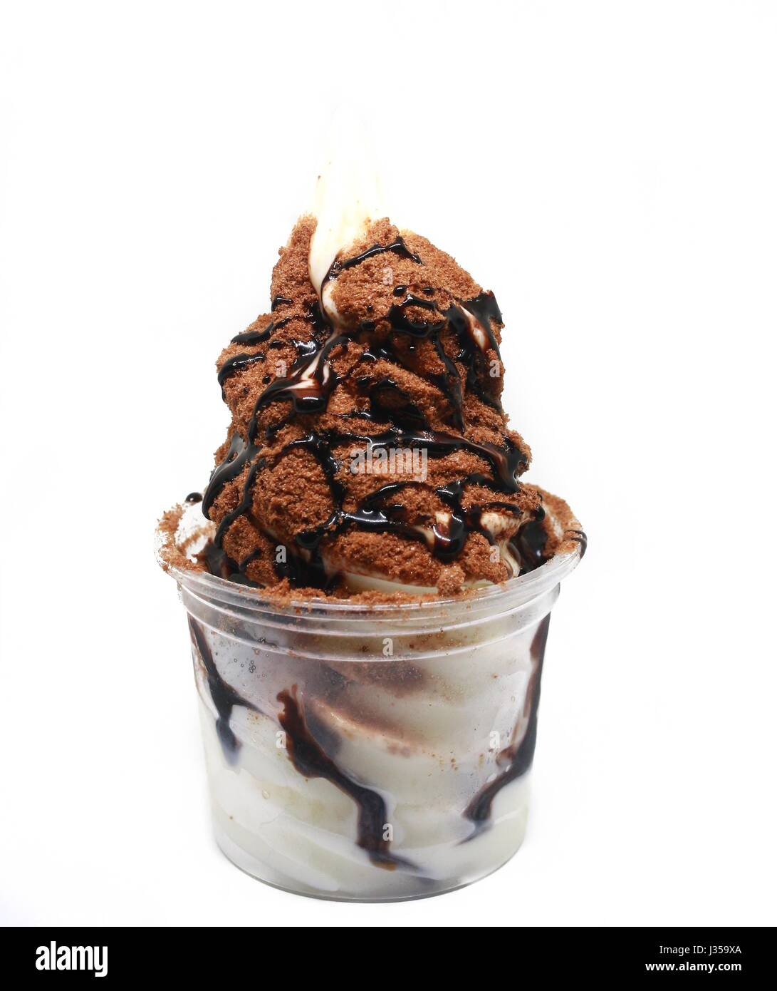 soft serve ice cream in a cup with topping Stock Photo Alamy