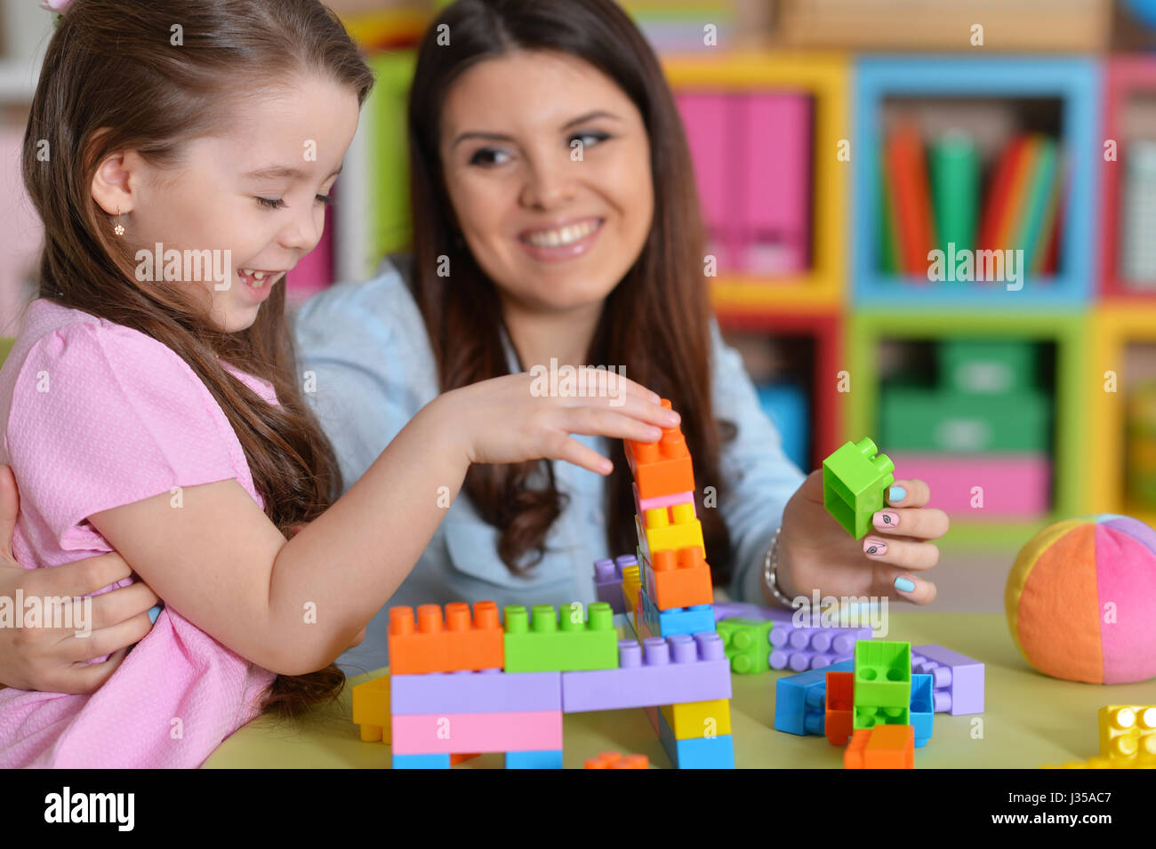 Mom and daughter having fun together Stock Photo Alamy