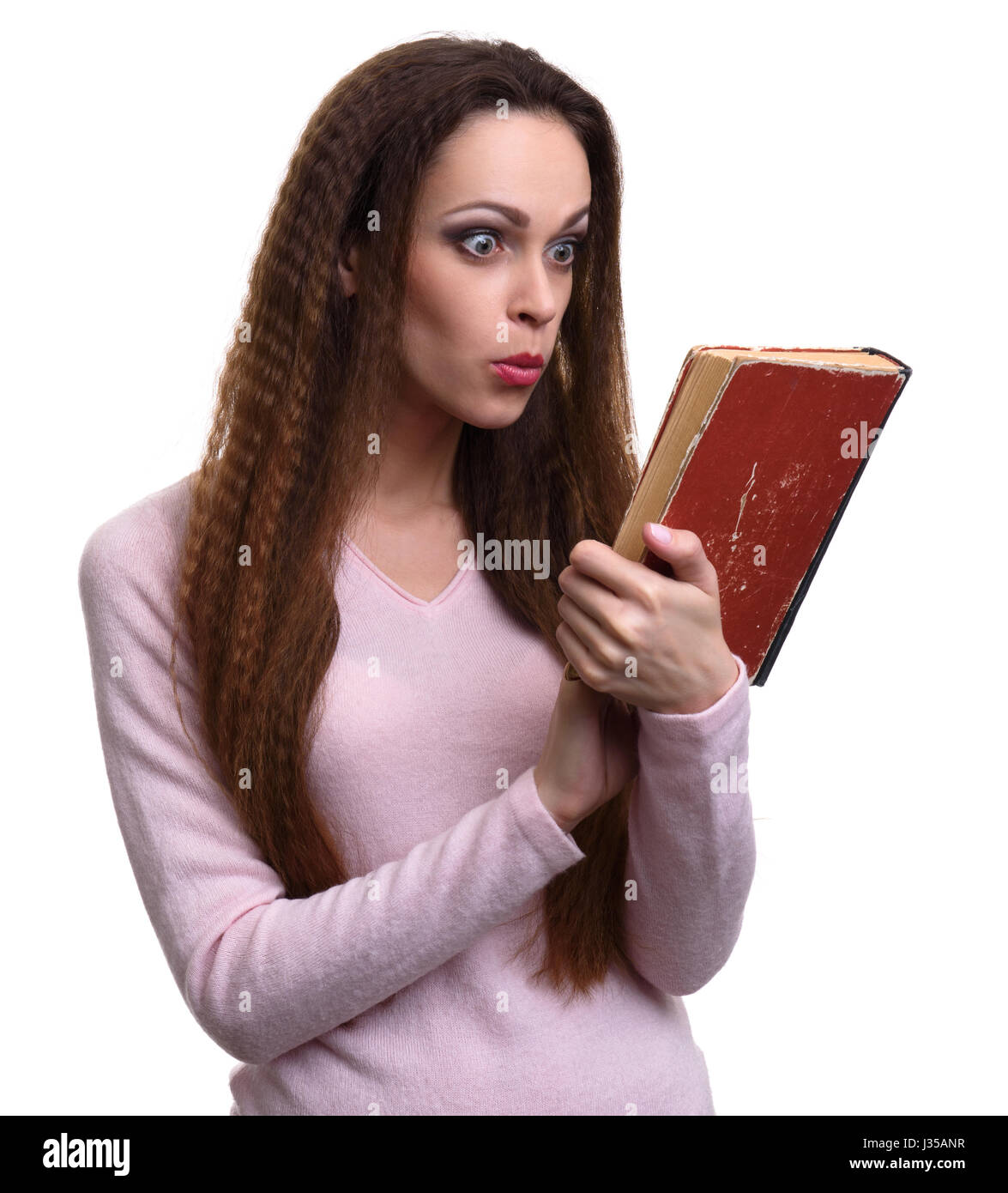Книга удивлений. Девушка с книгой удивляется. Удивленная девочка с книгой. Удивление от книги. Девушка с книгой удивлена.