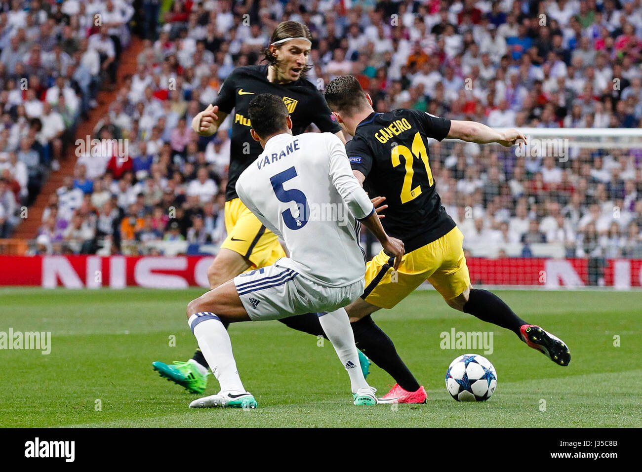 Madrid, Spain. 02nd May, 2017. Raphael Varane (5) Real Madrid's player. Filipe Luis Kasmirski (3) Atletico de Madrid's player.Kevin Gameiro (21) Atletico de Madrid's player.UEFA between Real Madrid vs Atletico de Madrid at the Santiago Bernabeu stadium in Madrid, Spain, May 2, 2017 . Credit: Gtres Información más Comuniación on line,S.L./Alamy Live News Stock Photo