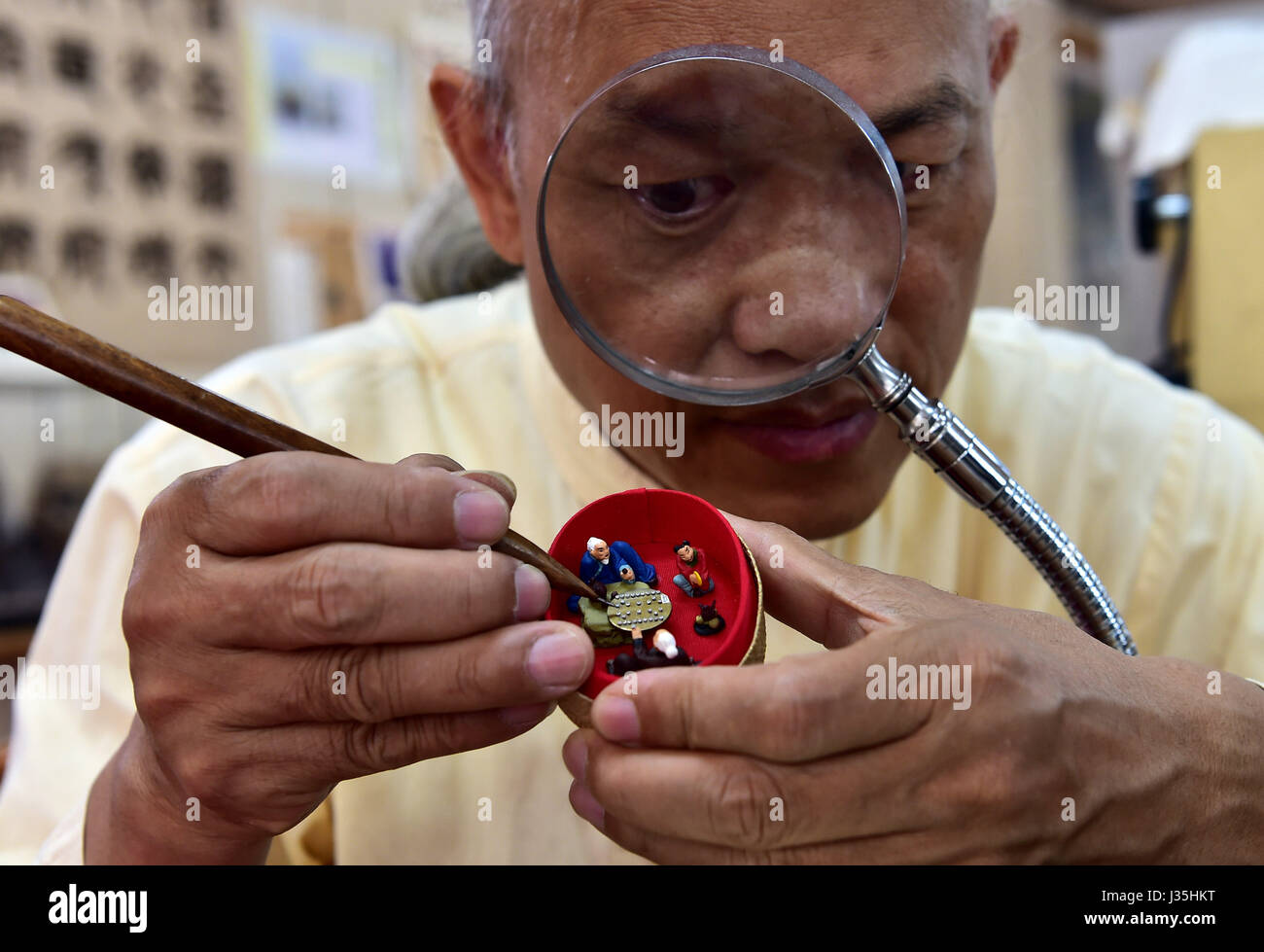 Taipei's Taiwan. 3rd May, 2017. Folk artist Chen Fengxian works on his ...