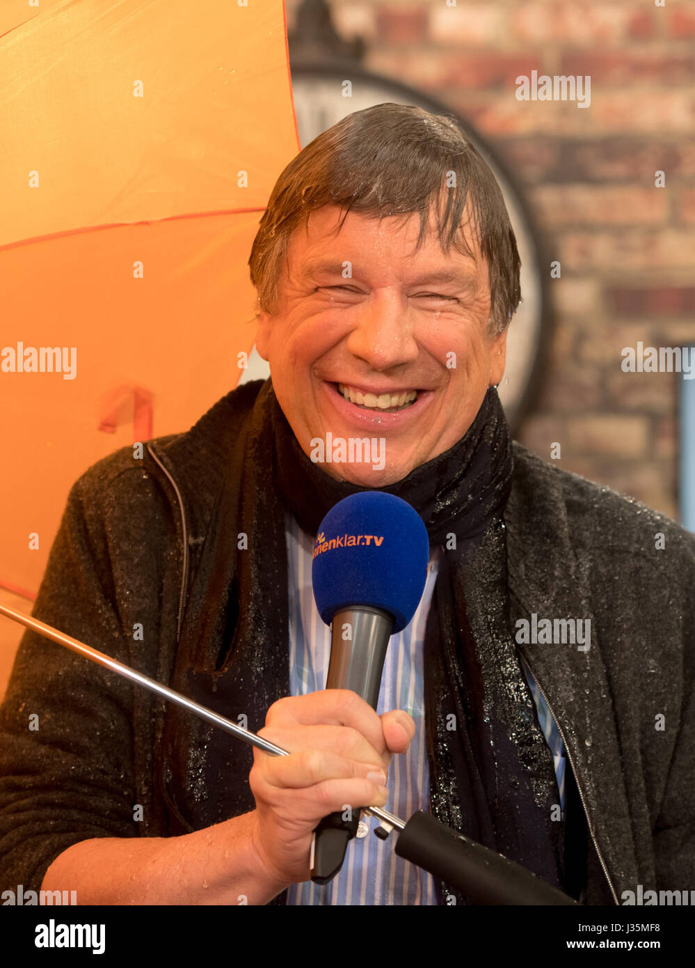 Munich, Germany. 03rd May, 2017. Weather presenter Jorg Kachelmann laughs at the TV studio of the sonnenklar.TV station in Munich, Germany, 03 May 2017. On 04 May Kachelmann will present the 'Kachelmannwetter' show, which will air once monthly. Photo: Tobias Hase/dpa/Alamy Live News Stock Photo