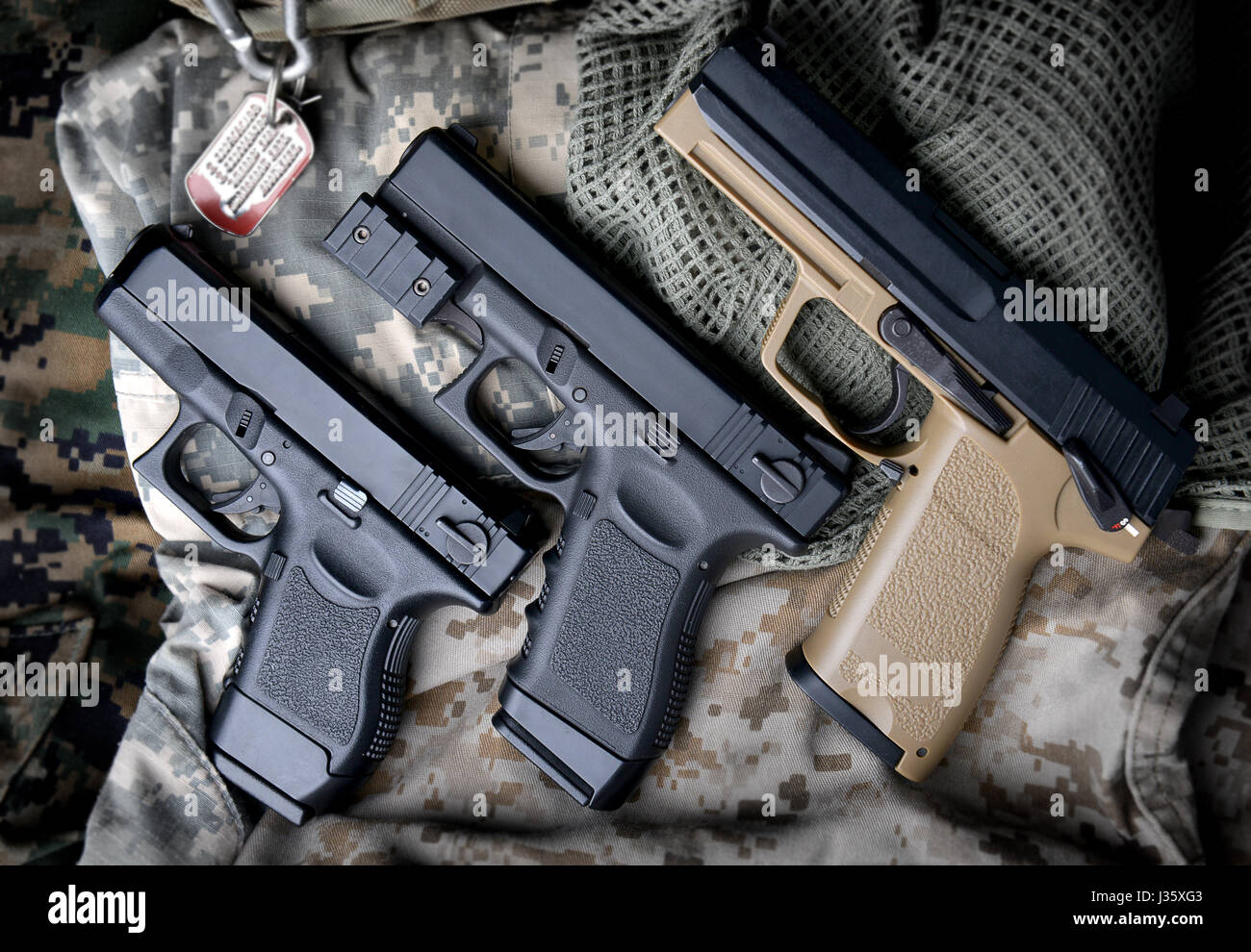 Pistal automatic short hand gun in the US army prop background photo in ...