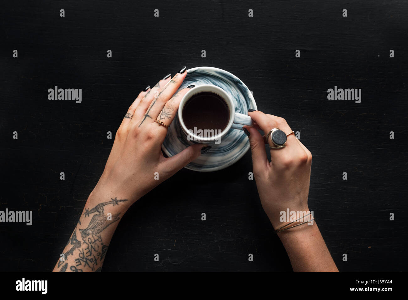 Tattoo Hands with Coffee Cup Beverage Stock Photo