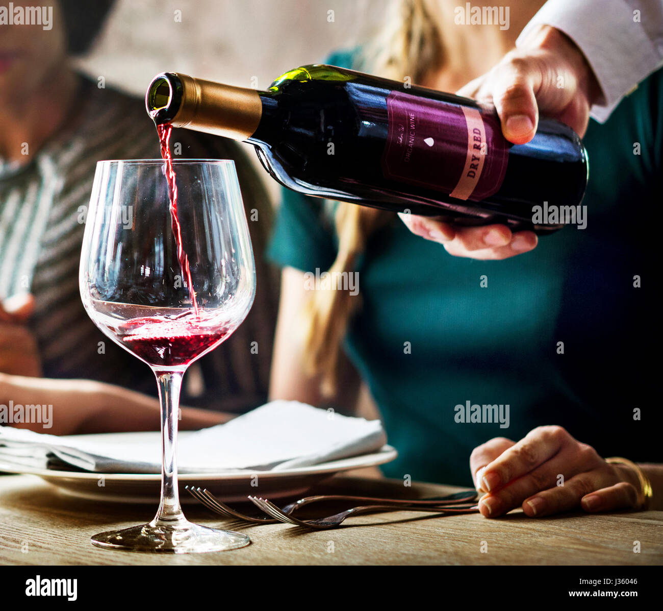 Wine Waiter Pouring Wine High Resolution Stock Photography and Images