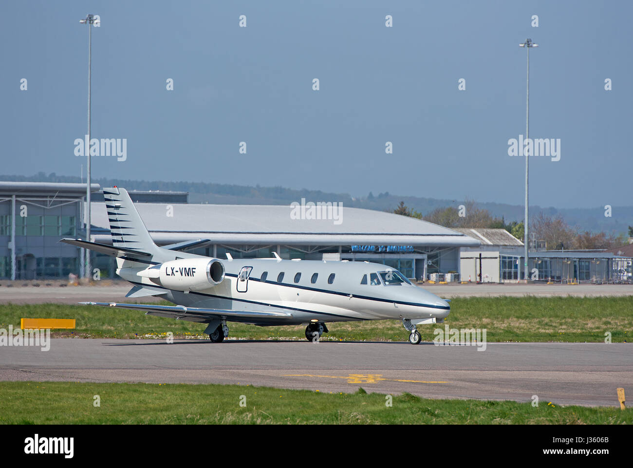 Mid sized business Twin Engined Jet Aircraft preparing to depart Inverness Airport i the Scottish Highlands. Stock Photo