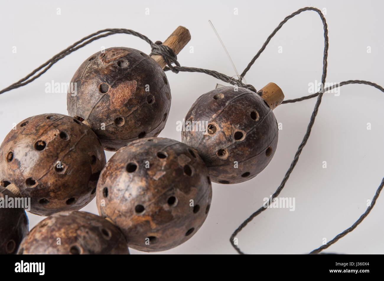 African handmade instrument, rattle isolated on white background Stock