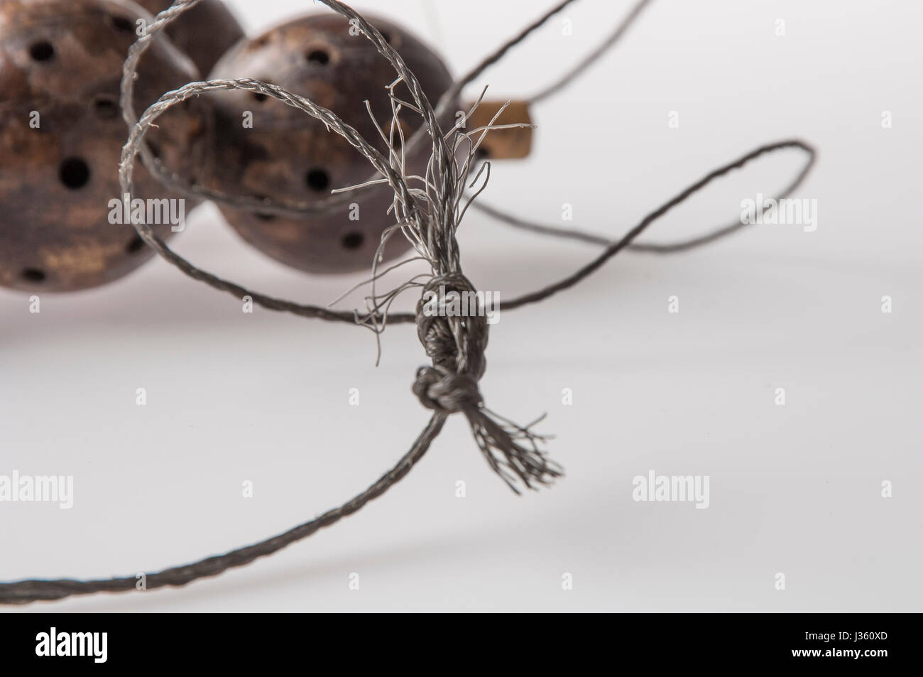 African handmade instrument, rattle isolated on white background Stock