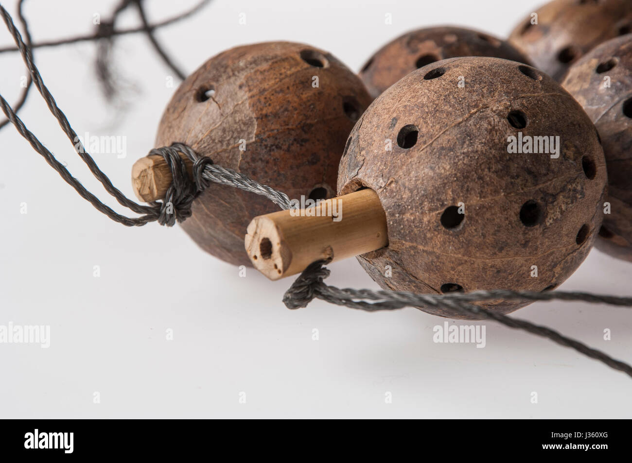 African handmade instrument, rattle isolated on white background Stock