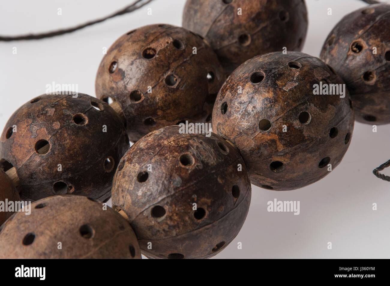 African handmade instrument, rattle isolated on white background Stock