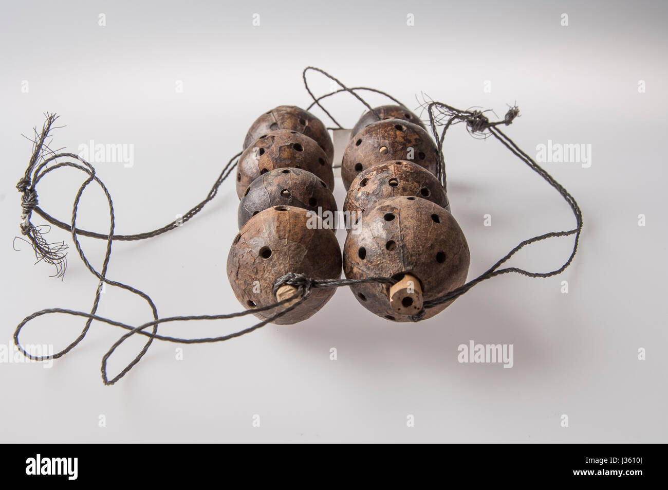 African handmade instrument, rattle isolated on white background Stock