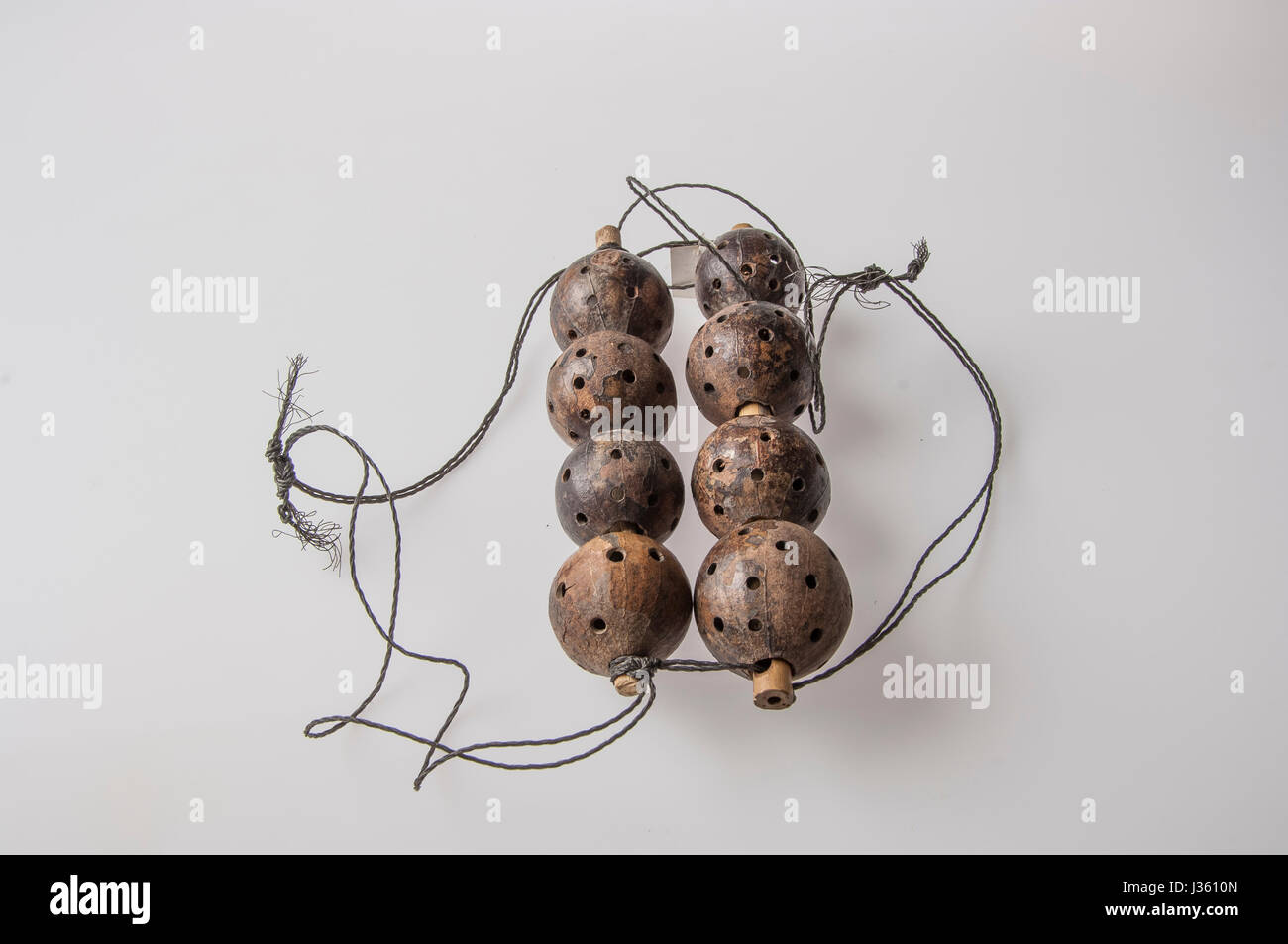 African handmade instrument, rattle isolated on white background Stock