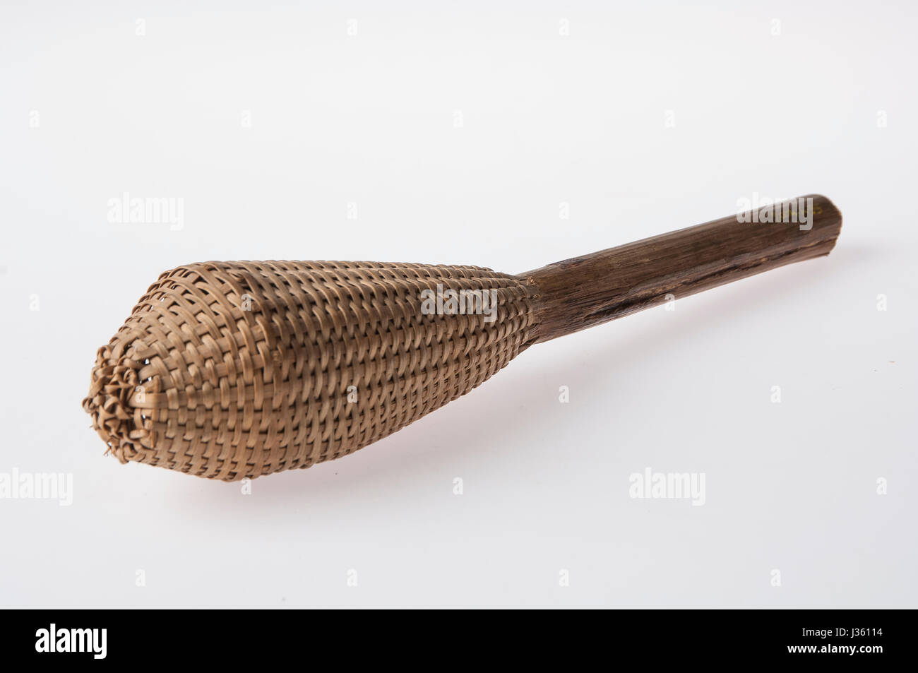 African handmade instrument, rattle isolated on white background Stock