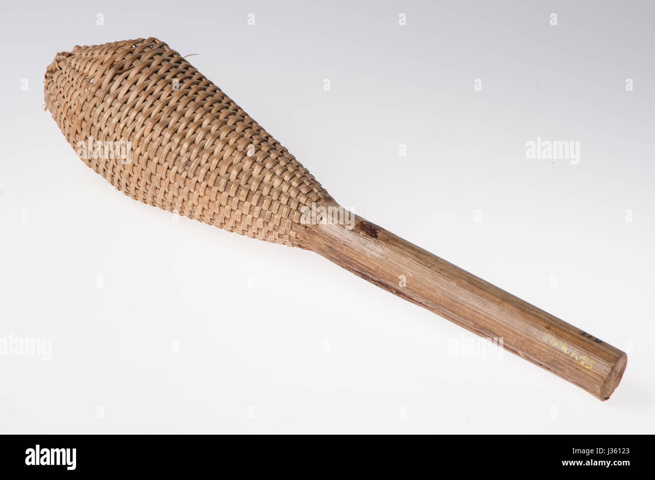 African handmade instrument, rattle isolated on white background Stock