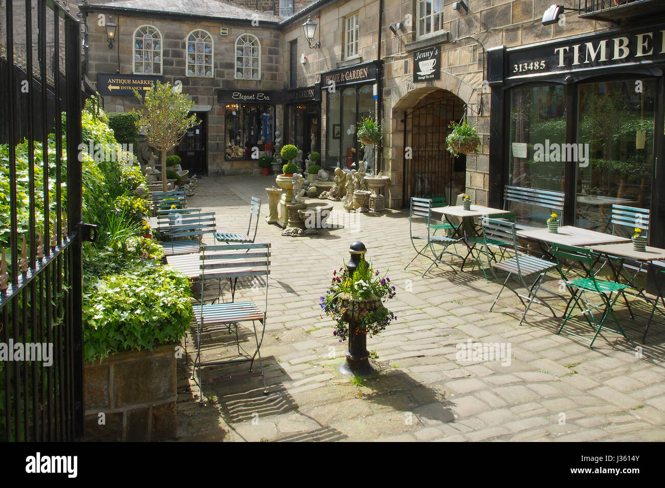 Cobbled courtyard of a shop and cafe in Montpellier, Harrogate