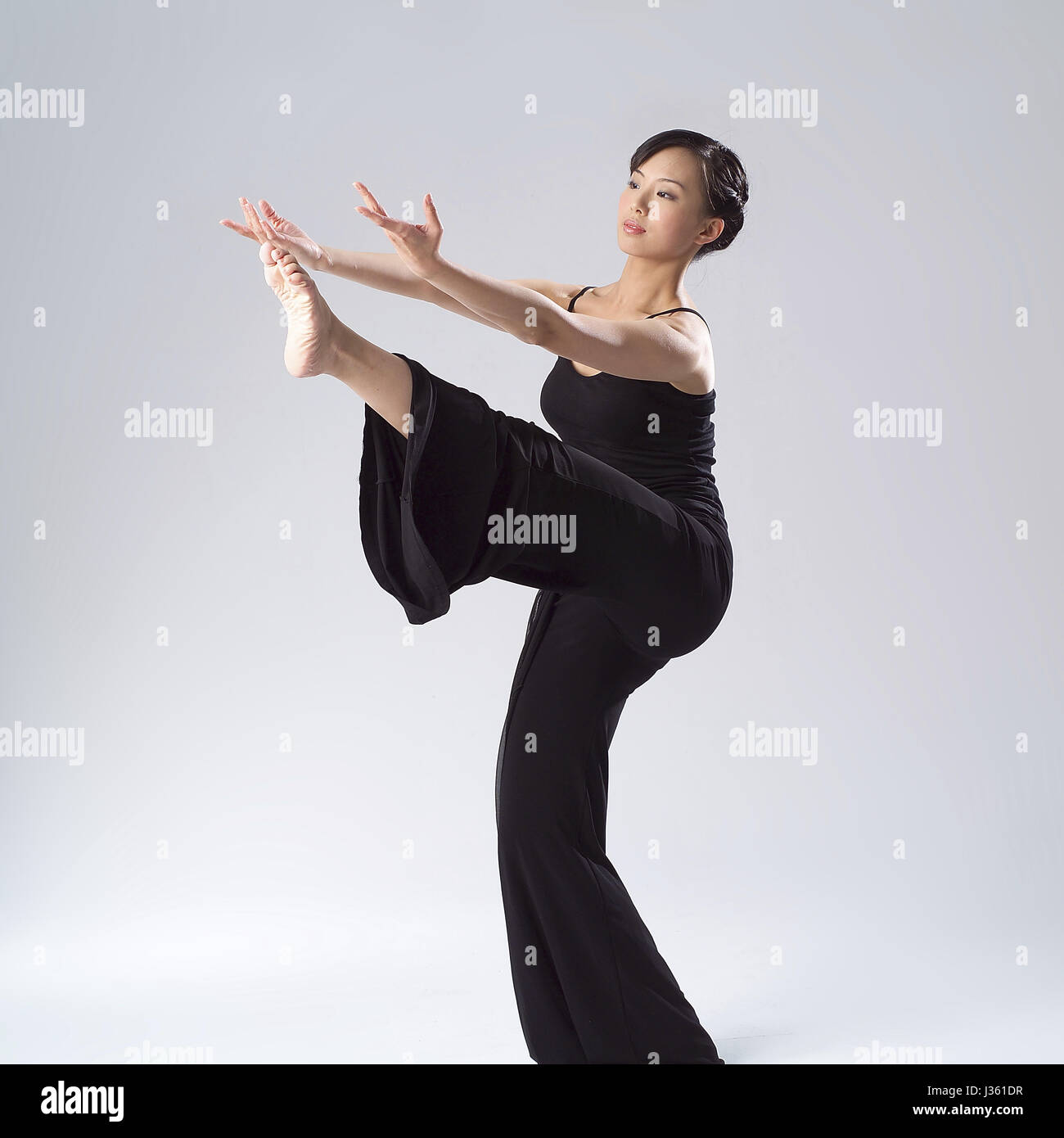Chinese woman dancing barefoot hi-res stock photography and images - Alamy