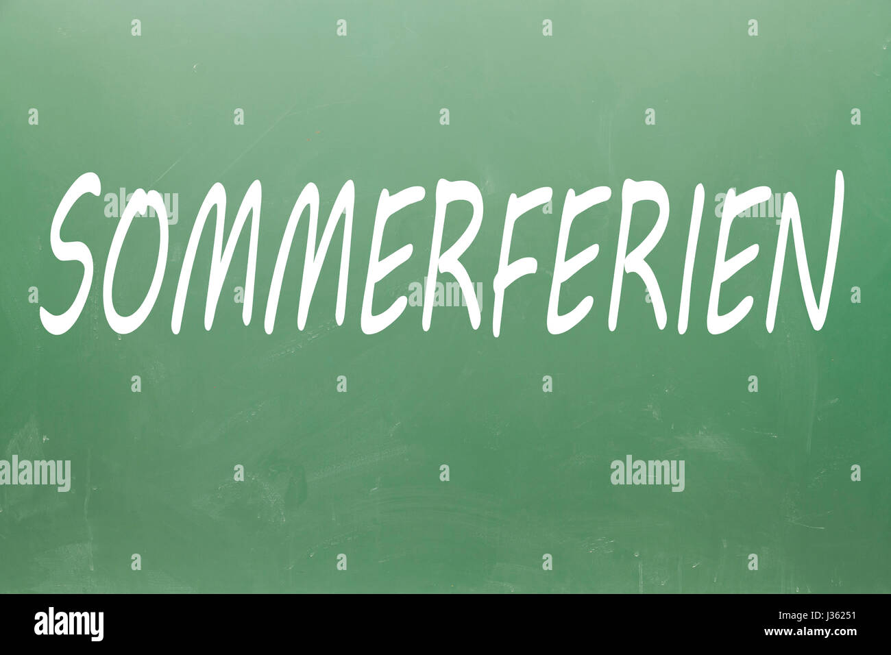 Sommerferien (summer holidays in german) written on blackboard Stock Photo