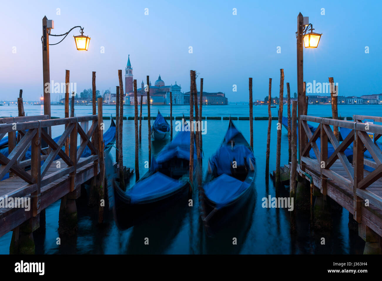 Dawn view of gondolas moored in Venice , Italy Stock Photo