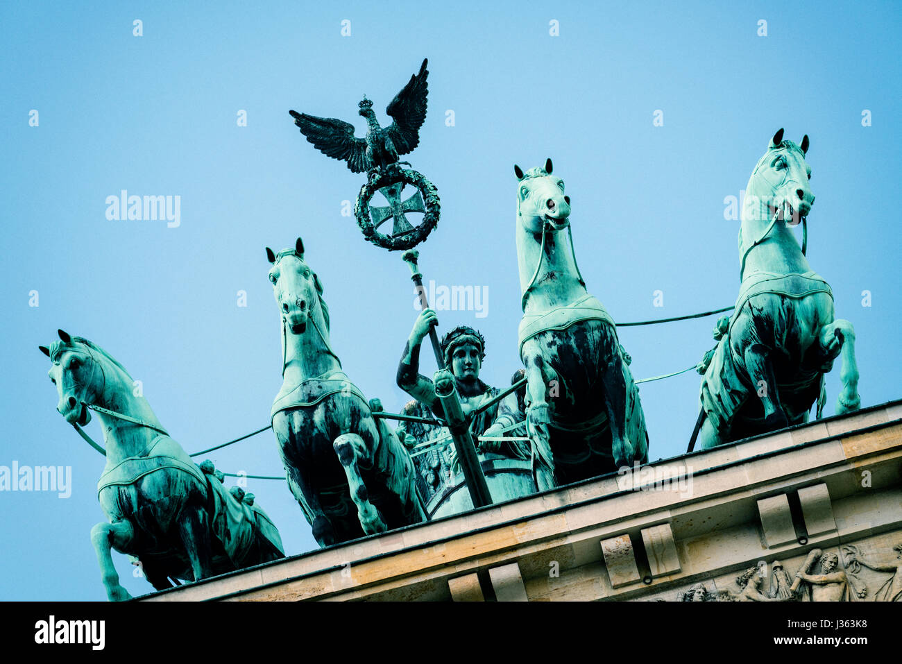 Detail of Quadriga statue on top of Brandenburg Gate in Berlin, Germany Stock Photo