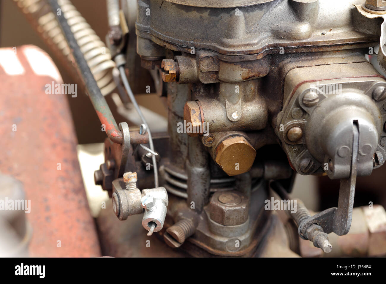 a detail of the carburettor of an old car Stock Photo Alamy