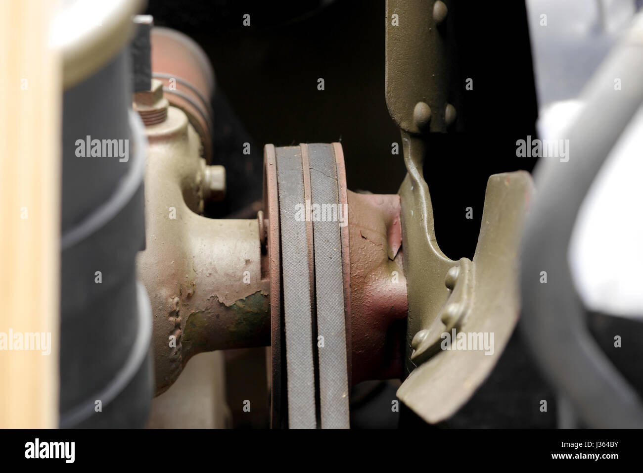 a double belt fan of a vintage car Stock Photo - Alamy