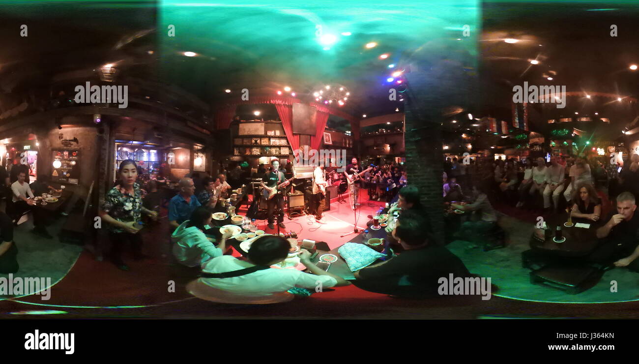 (EDITORS NOTE This is a 360 degree photo.) People listen to live music at Saxophone Pub in the