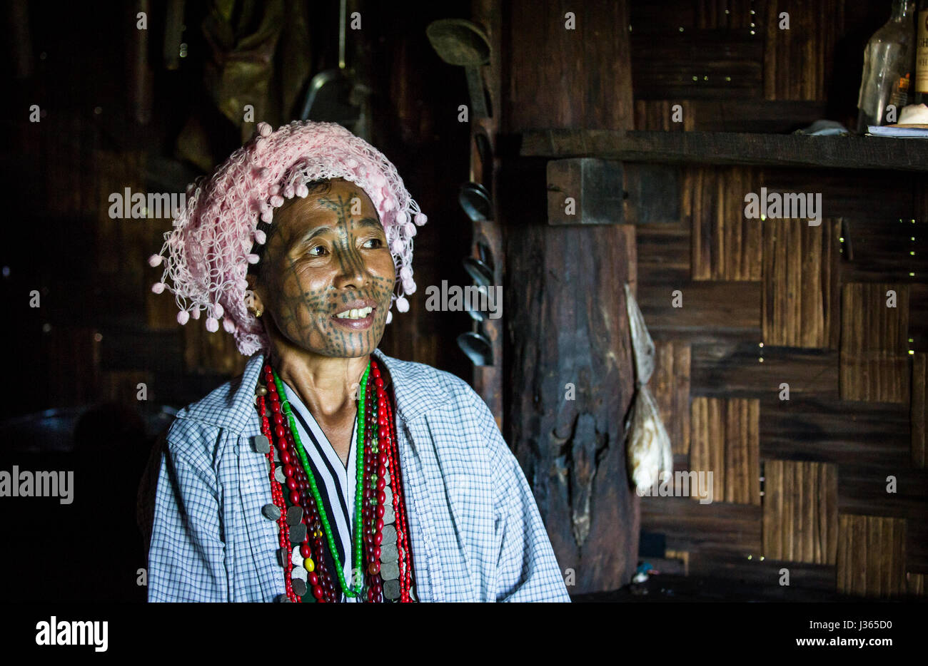 Chin region, Myanmar, November 11, 2014: muun tribe chin lady in her kitchen Stock Photo