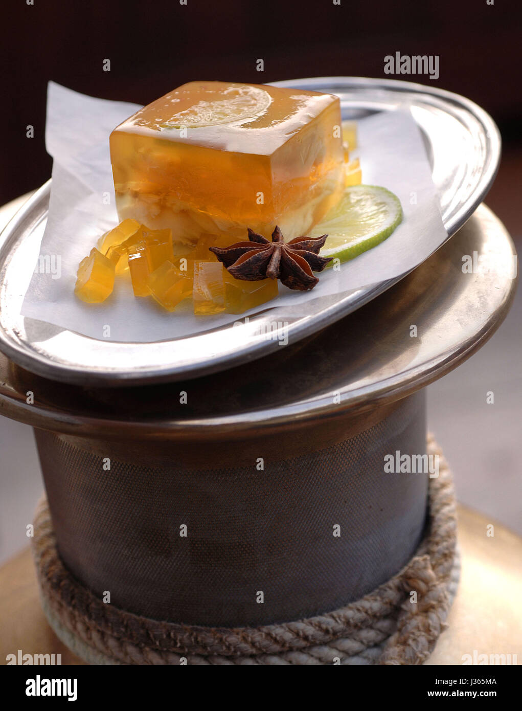 June, welcome on board with the 'Yachting' menu: monk fish medaillons in saffron jelly Stock Photo