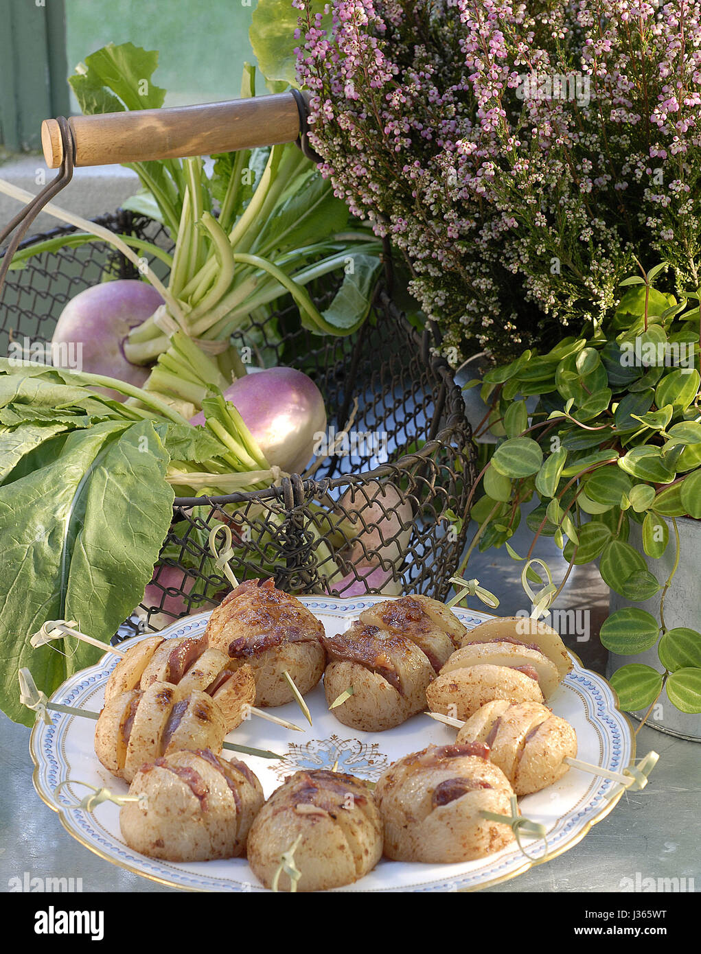 October, meal on a forest theme: gizzards in sliced glazed turnips Stock Photo
