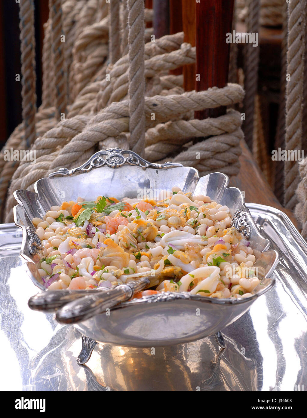June, welcome on board with the 'Yachting' menu: cranberry bean salad with seafood Stock Photo