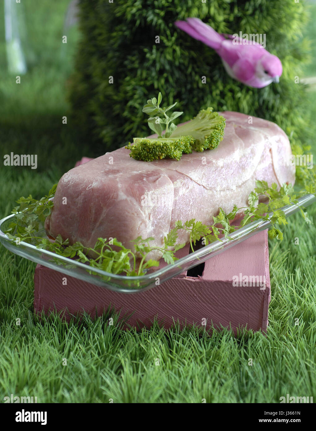 May, meal in pink and green theme: light broccoli ham terrine Stock Photo