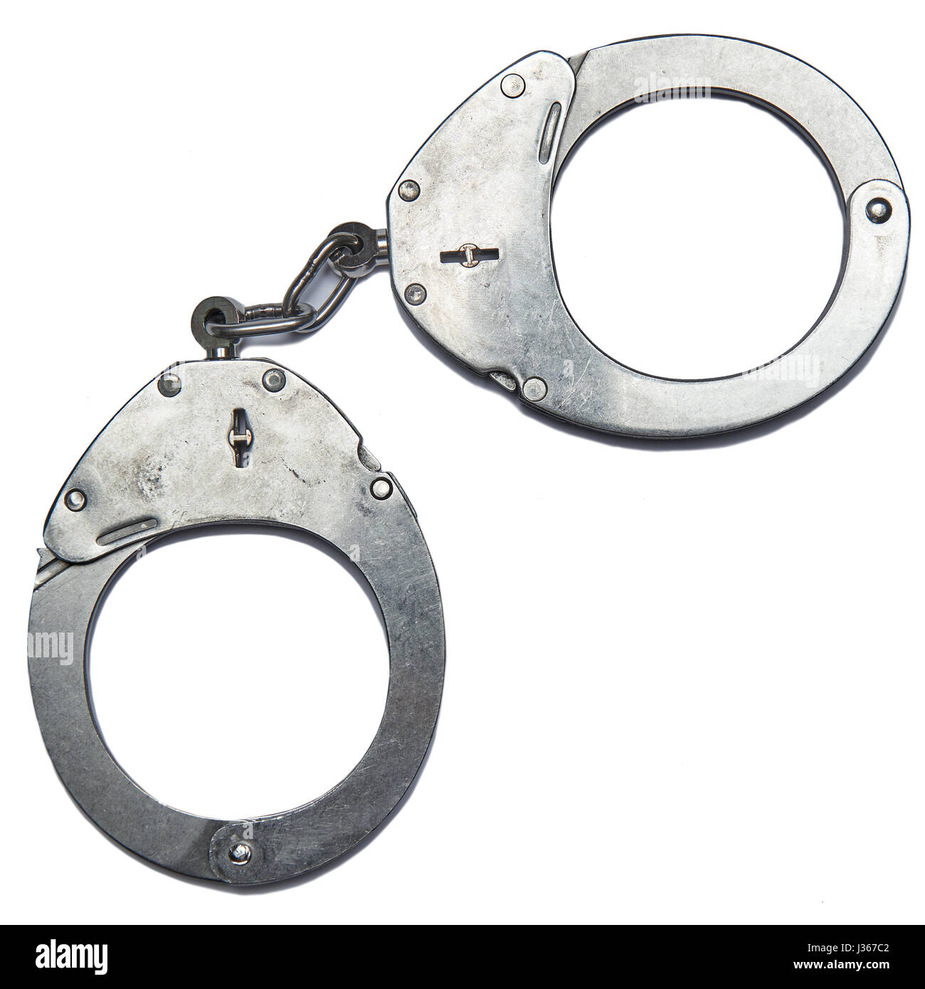 German police handcuffs isolated on white background. Stock Photo