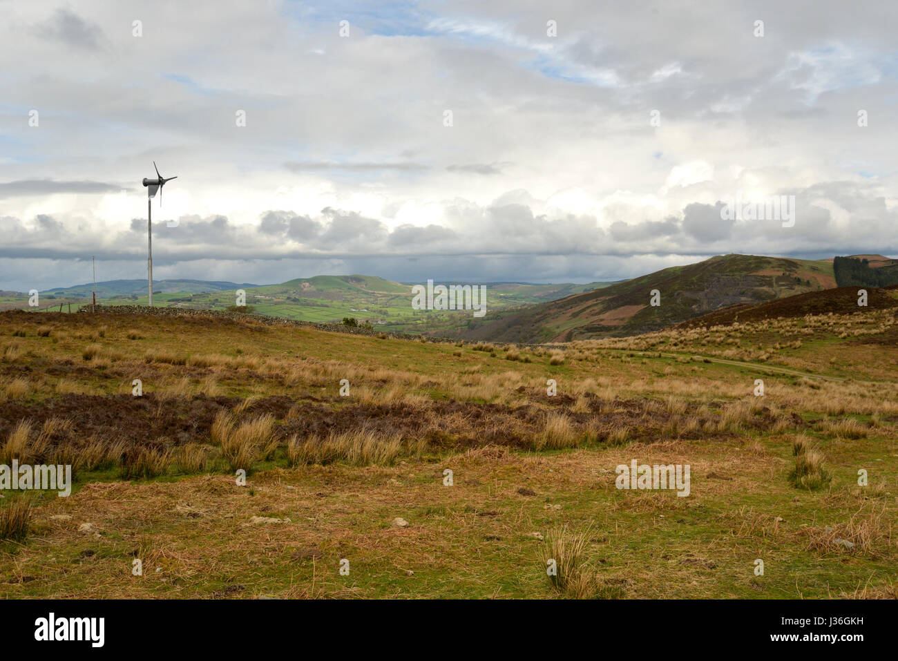 A Wind Turbine on Carngafallt Common in stormy conditions Stock Photo