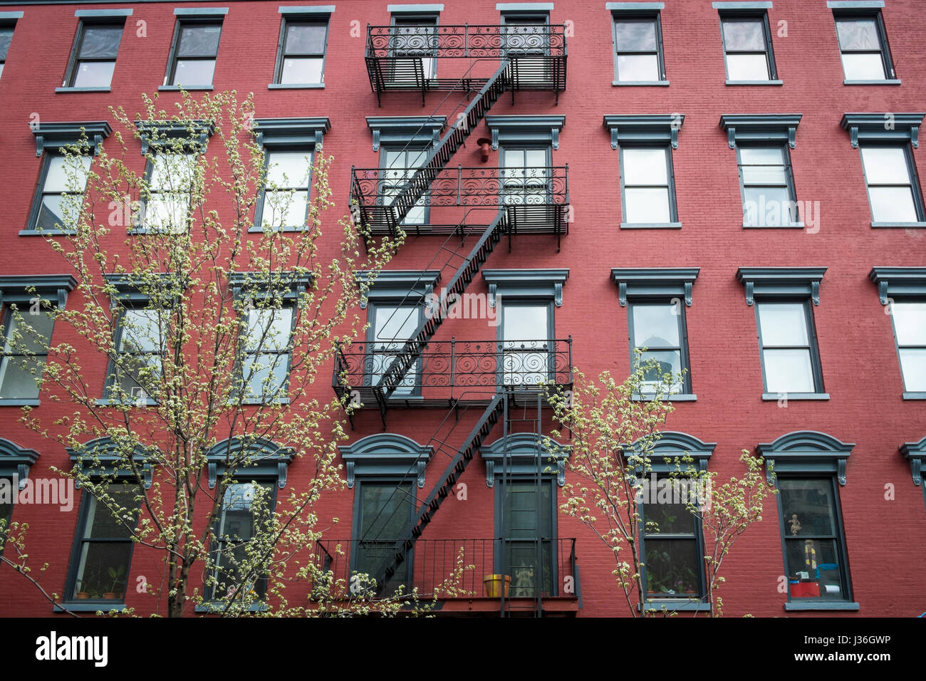 Old red brick apartment building in New York City Stock Photo - Alamy