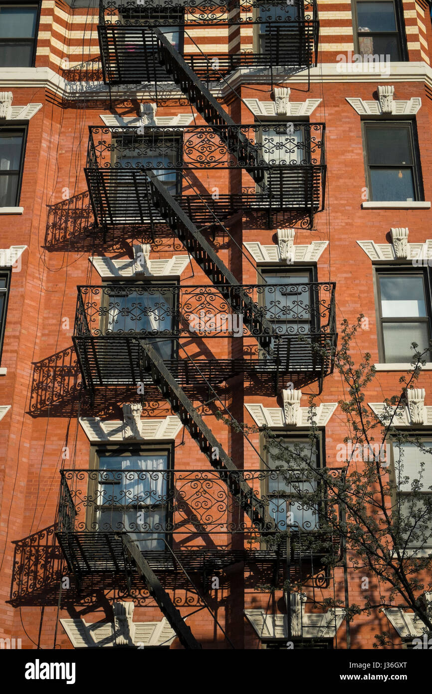 Classic old apartment building with fire escape, New York City Stock ...