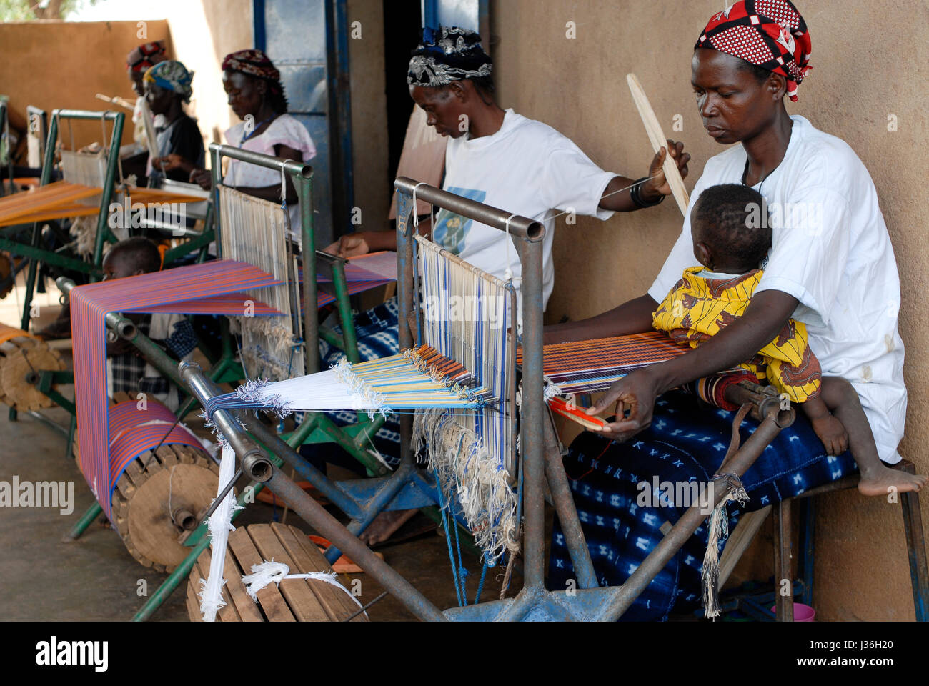 Burkina Faso, Kaya, aid project of catholic church for forced married women in Boken, vocational training and employment as weaver Stock Photo