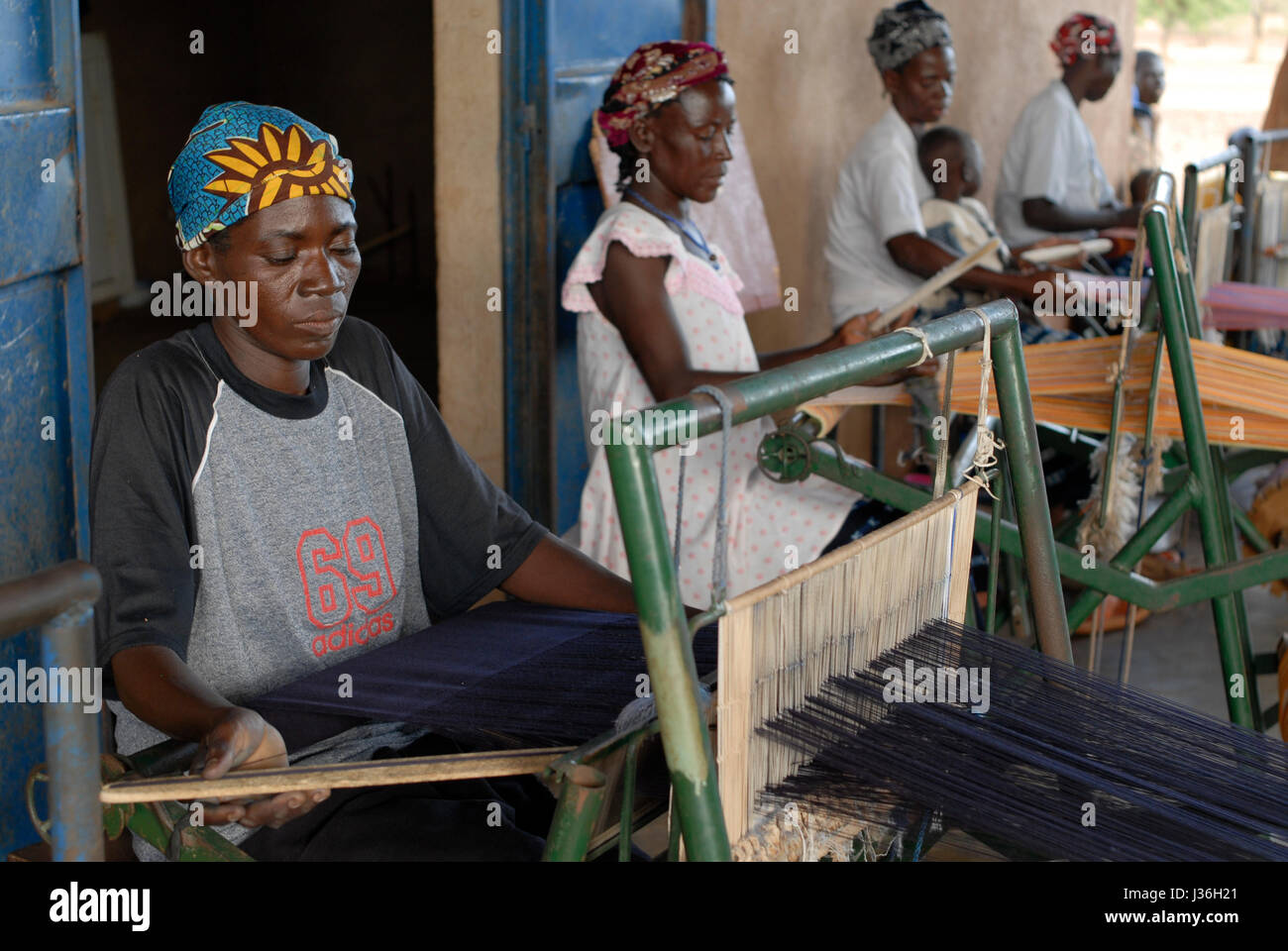 Burkina Faso, Kaya, aid project of catholic church for forced married women in Boken, vocational training and employment as weaver Stock Photo
