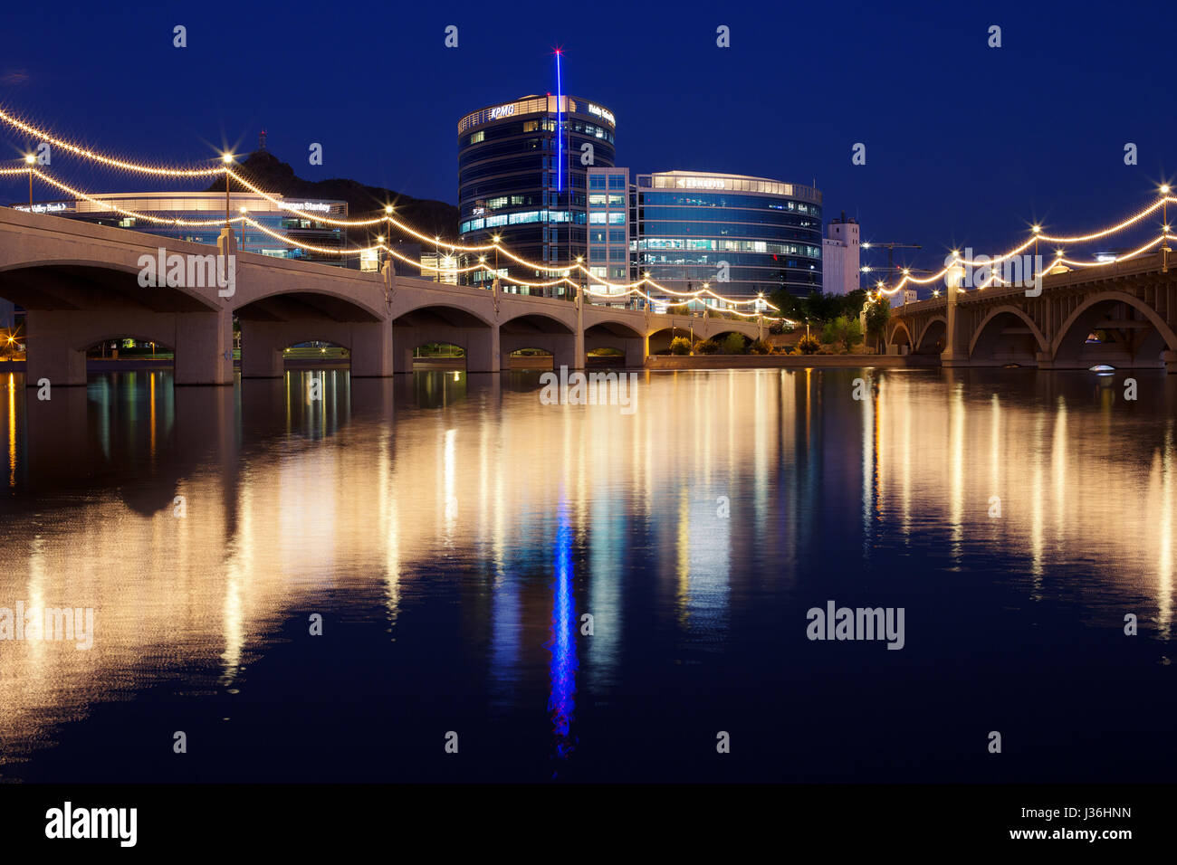Tempe Town Lake Park waterfront and cityscape at night in Tempe, Arizona Stock Photo