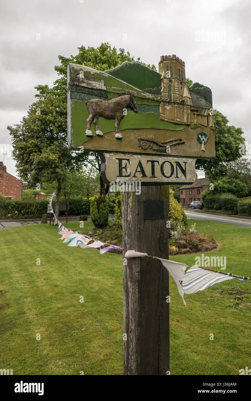 Eaton Village Sign with bunting Stock Photo Alamy