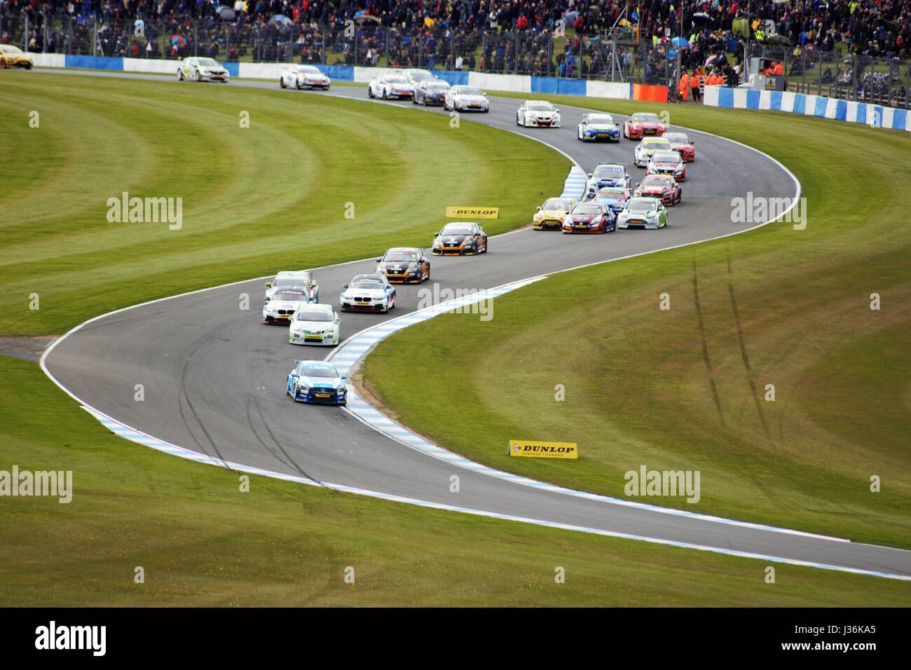 BTCC Championship round 2 Donington Park 2017. Easter Bank holiday weekend. Picture of race one down through Craner curves .Moffet leading the pack. Stock Photo