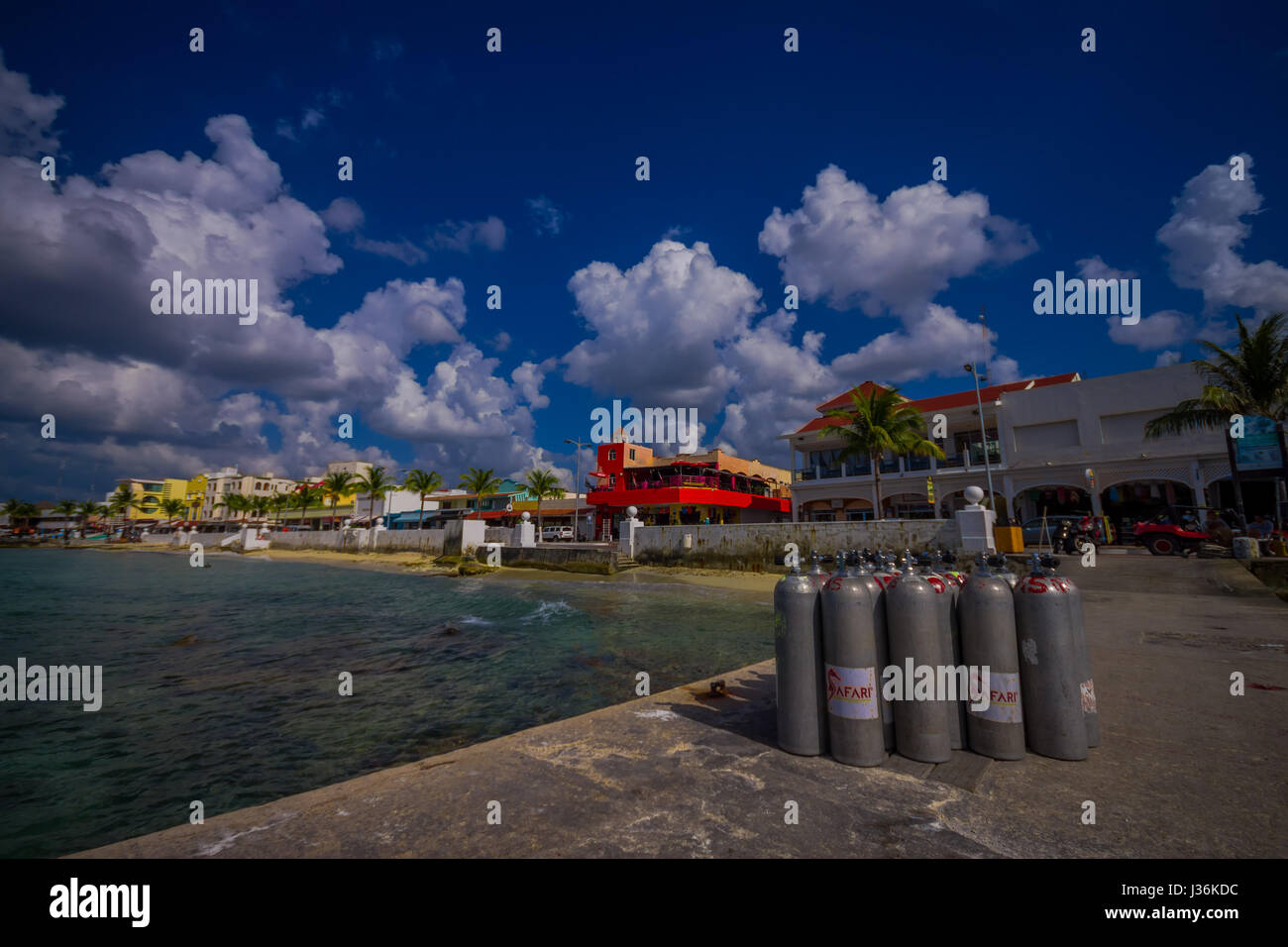 COZUMEL, MEXICO - MARCH 23, 2017: Oxygen tanks for scuba diving, that are use for tourist that rent boats to raid to visit the coral reefs and enjoy the colorful nature under the sea Stock Photo