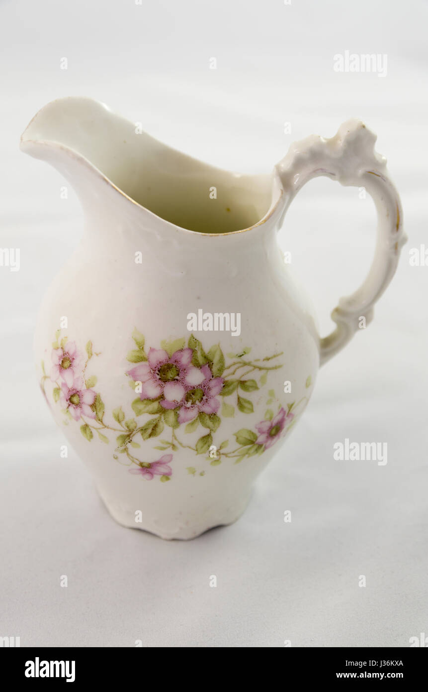 Antique porcelain painted pitcher Stock Photo