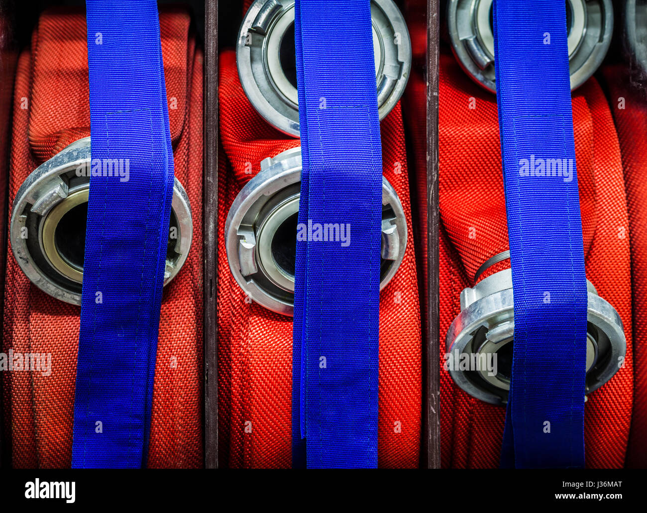 Lined fire hose hires stock photography and images Alamy