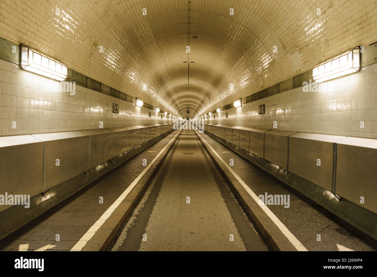 Straight view into the old St. Pauli Elbe Tunnel in Hamburg, Germany. Stock Photo