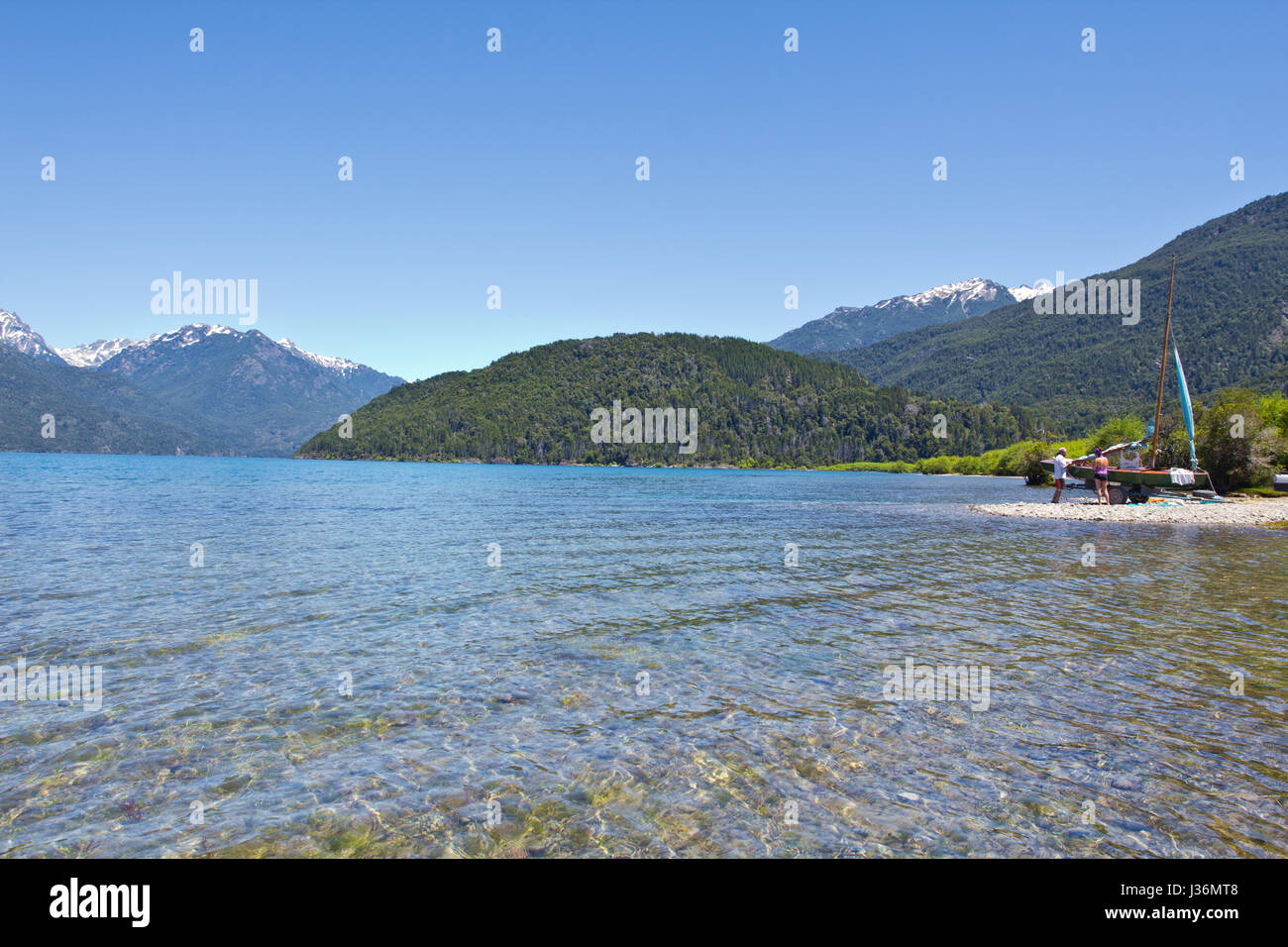 Lake side with mountain range in the background close to El Bolsón. Perfect place for fly fishing, trekking, rafting, climbing, and other outdoor acti Stock Photo