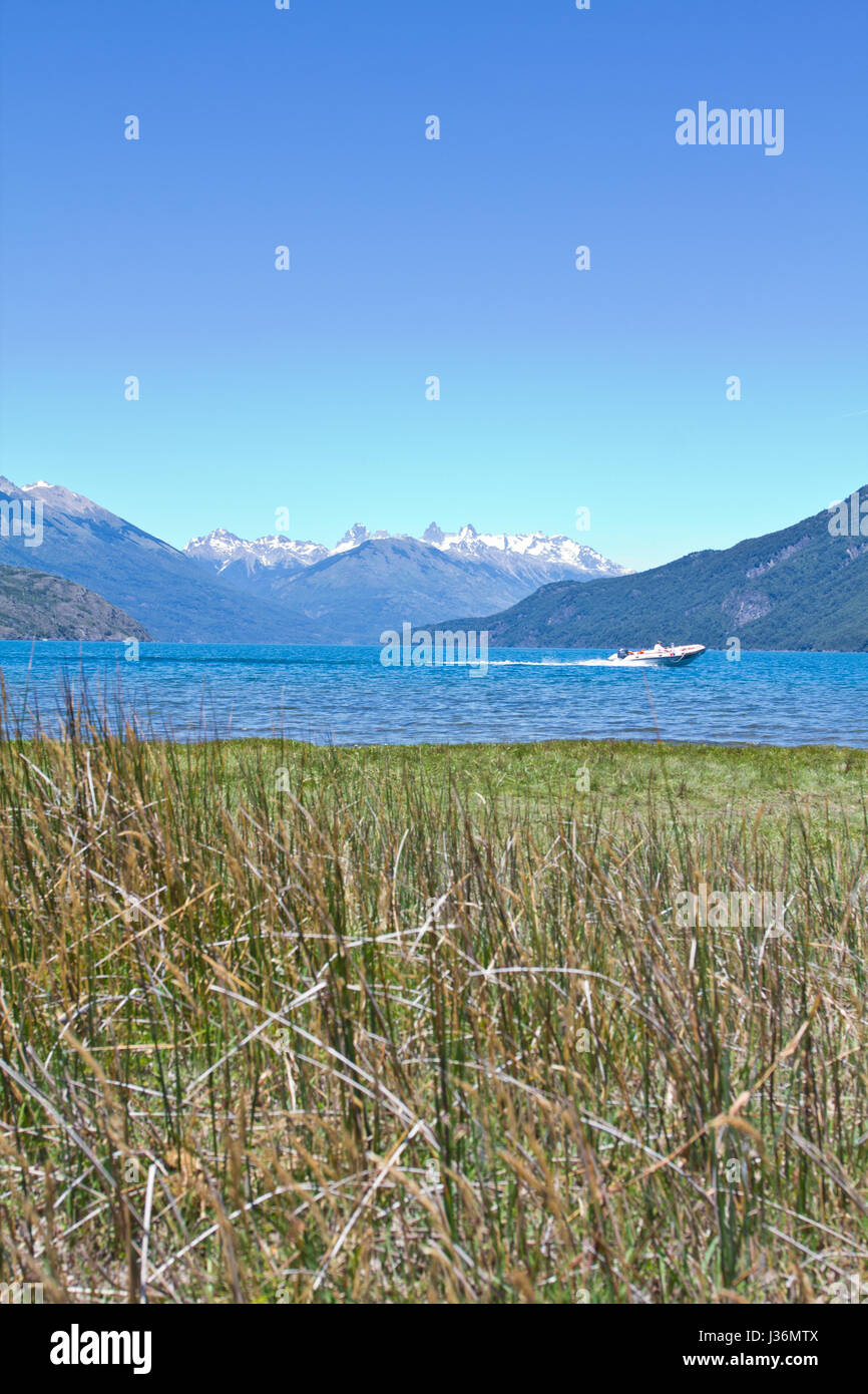 Lake side with mountain range in the background close to El Bolsón. Perfect place for fly fishing, trekking, rafting, climbing, and other outdoor acti Stock Photo