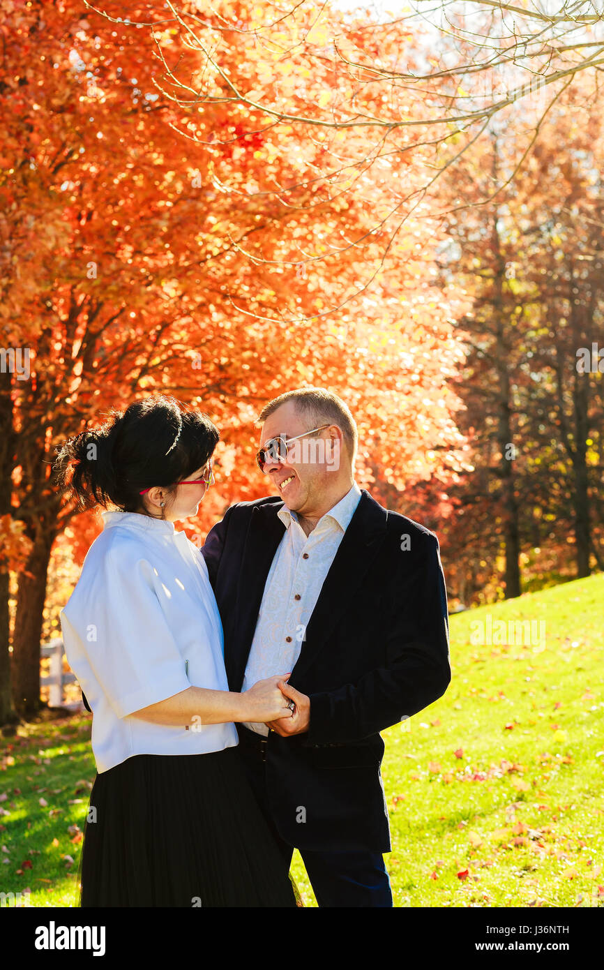 Beautiful portrait of happy young couple in love on a walk in autumn ...