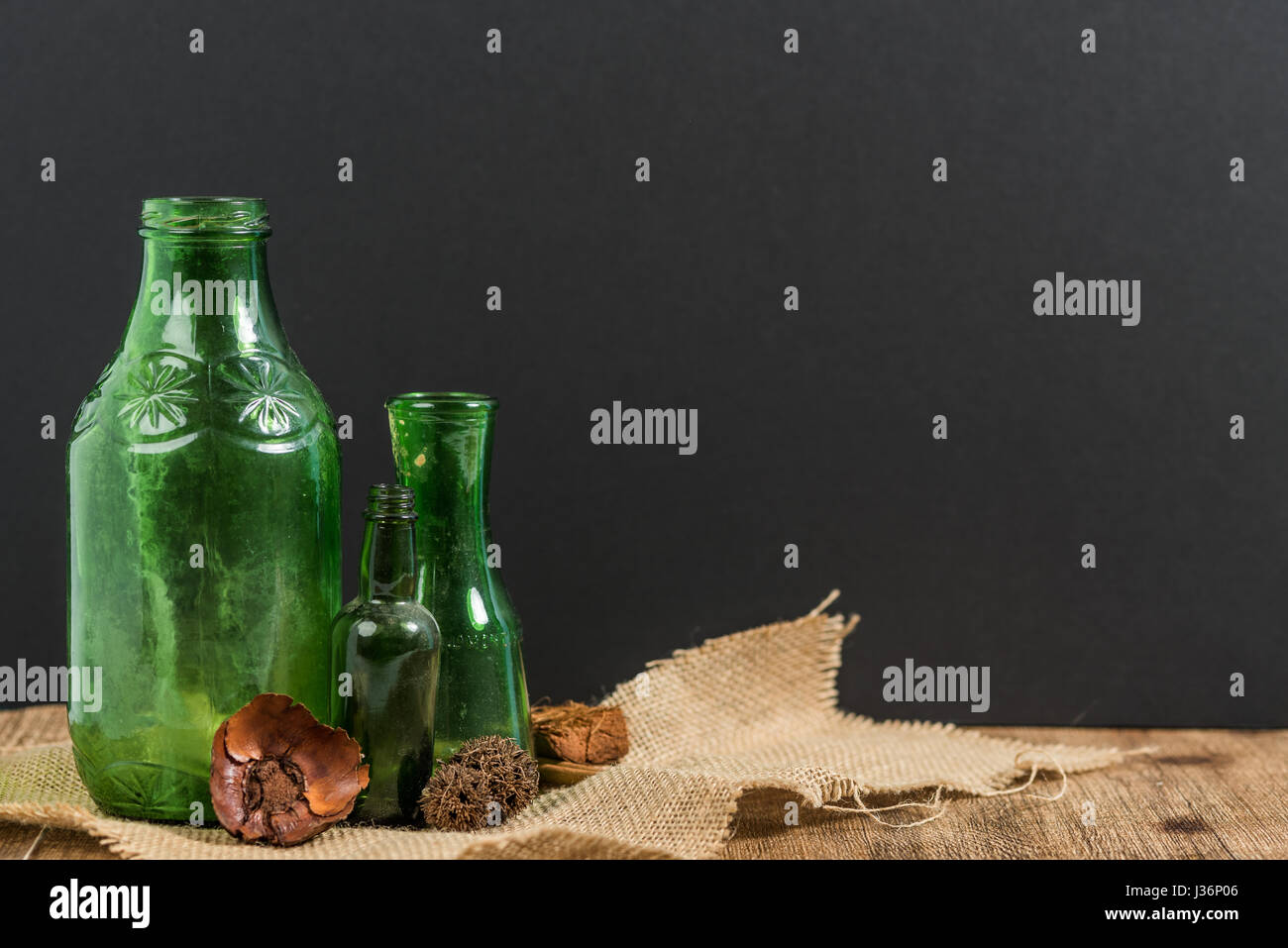 Vintage bottles in rustic setting Stock Photo Alamy