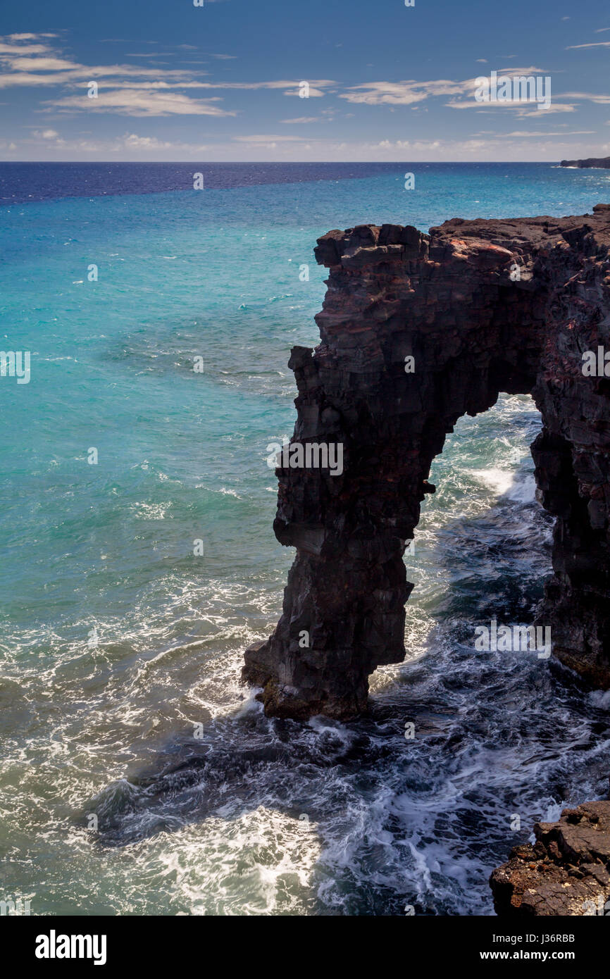 Holei Sea Arch on the south coast of Big Island in the Hawaii Volcanoes National Park on Big Island, Hawaii, USA. Stock Photo