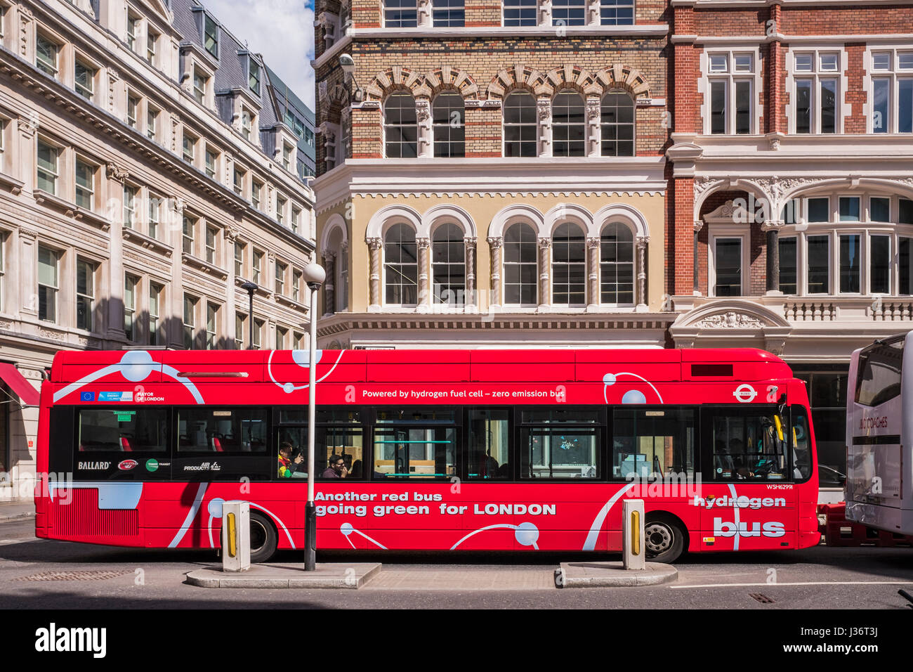 Red Hydrogen powered bus going through the City of London, England, U.K. Stock Photo